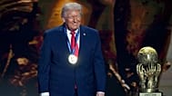 US President Donald Trump smiles after being awarded the FIFA Peace Prize during the draw for the 2026 World Cup in Washington, 5 December, 2025