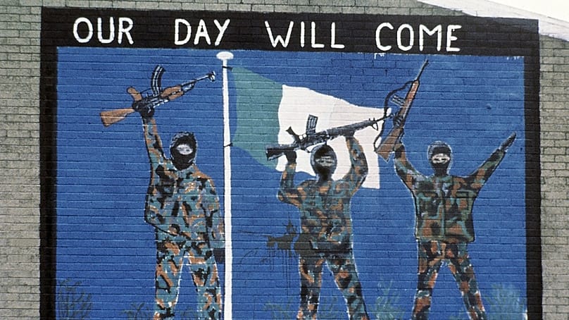 FILE: A wall painting supporting the Irish Republican Army, seen in the Catholic area of Belfast, Northern Ireland on Nov. 1985.