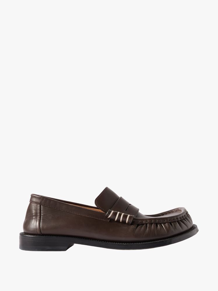 48-1 Image may contain: Clothing, Footwear, Sandal, and Shoe