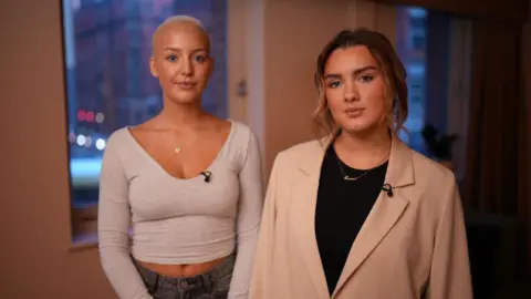 Brijesh Patel Grace and Sophie pose for a photo.