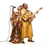 Image may contain Human Person Musical Instrument Musician Costume and Leisure Activities