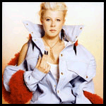 Image may contain Clothing Apparel Coat Human Person Home Decor Label and Text