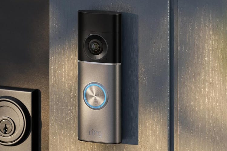 Ring's 4K doorbell on a wood slat.